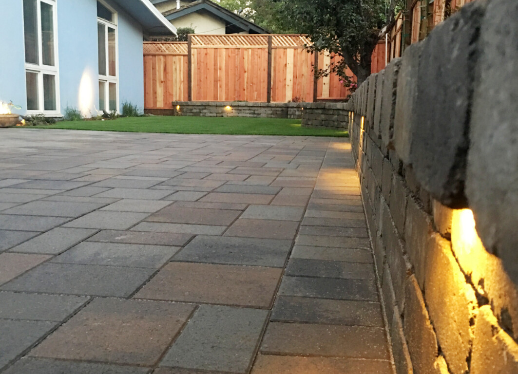 Beautiful concrete patio with decorative lighting in Lynwood, CA